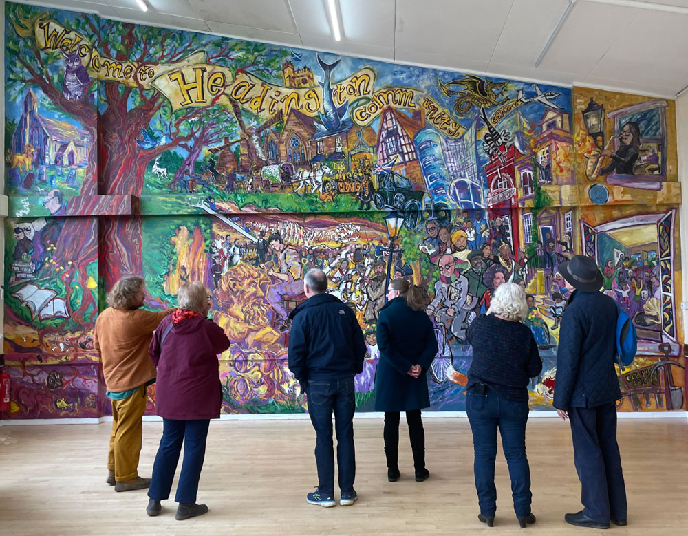Mural with visitors