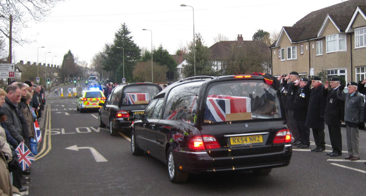 The coffins are draped in union flags