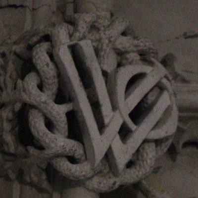 WO initials on Divinity School boss