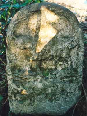 Boundary stone in middle of hill